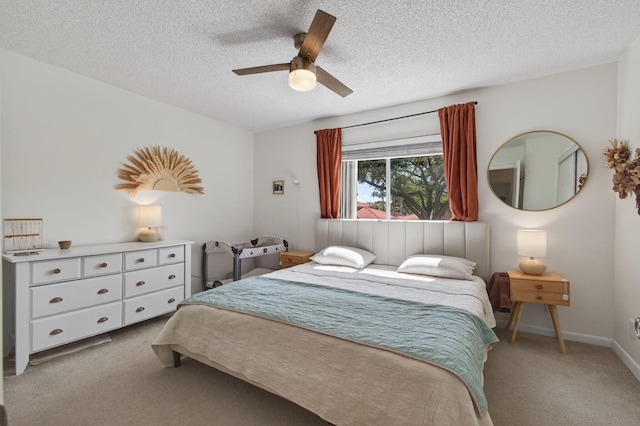 9931 Kamena Cir, Boynton Beach, FL 33436 - bedroom with carpet flooring, a textured ceiling, and a ceiling fan