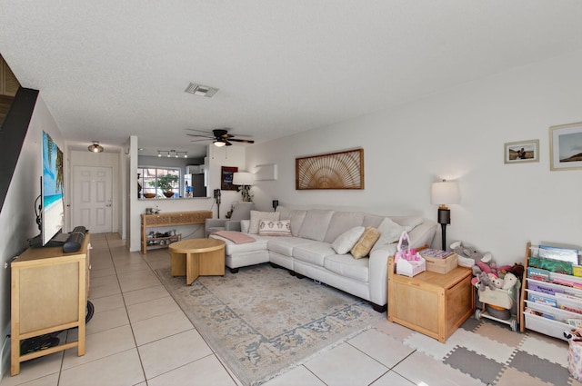 9931 Kamena Cir, Boynton Beach, FL 33436 - living area featuring light tile patterned floors and a ceiling fan