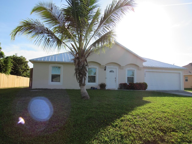 1482 SE Kirke Ln, Port Saint Lucie, FL 34983 - ranch-style house featuring stucco siding, a garage, a metal roof, and concrete driveway