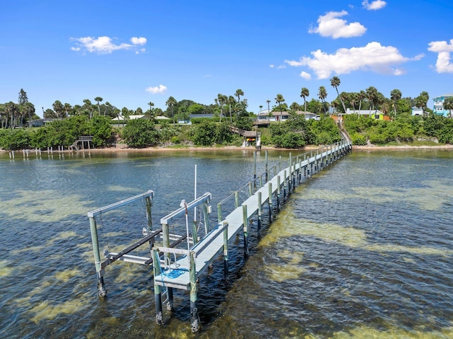 5203 S Indian River Dr, Fort Pierce, FL 34982 - dock area with a water view and boat lift
