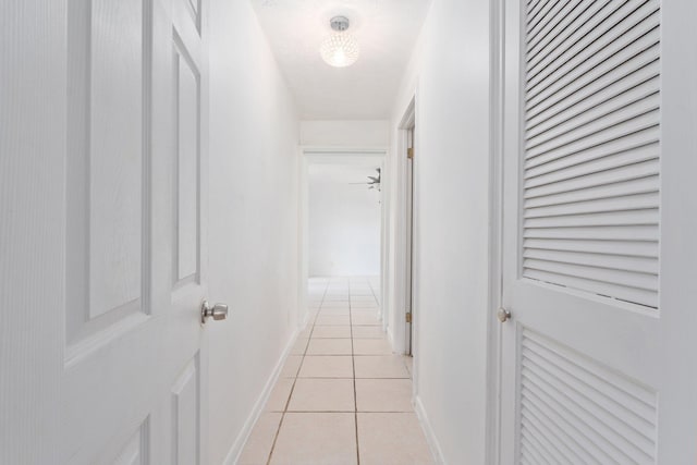 5203 S Indian River Dr, Fort Pierce, FL 34982 - corridor with light tile patterned flooring and baseboards