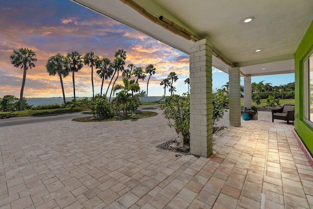 5203 S Indian River Dr, Fort Pierce, FL 34982 - view of patio featuring a water view