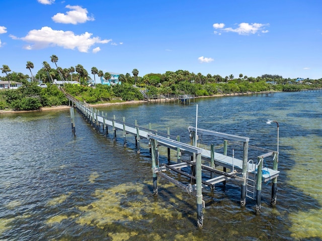 5203 S Indian River Dr, Fort Pierce, FL 34982 - dock area with a water view and boat lift