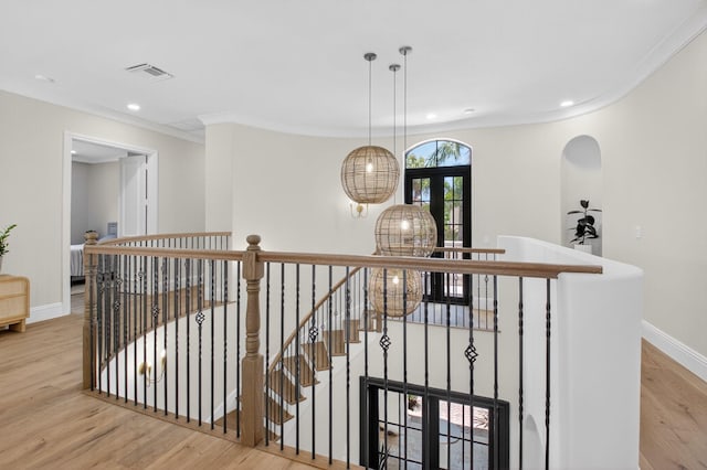 17865 Monte Vista Dr, Boca Raton, FL 33496 - hall featuring wood finished floors, an upstairs landing, recessed lighting, and crown molding