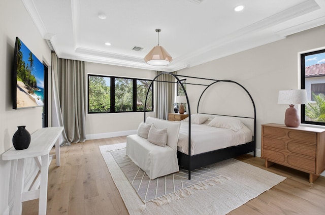 17865 Monte Vista Dr, Boca Raton, FL 33496 - bedroom featuring a raised ceiling, light wood-style flooring, recessed lighting, and ornamental molding