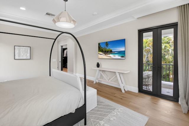 17865 Monte Vista Dr, Boca Raton, FL 33496 - bedroom with access to outside, french doors, ornamental molding, wood finished floors, and recessed lighting