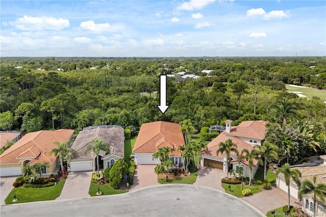 879 SW Pebble Ln, Palm City, FL 34990 - aerial perspective of suburban area featuring a forest