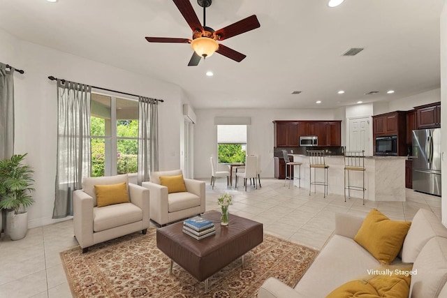 879 SW Pebble Ln, Palm City, FL 34990 - living area with recessed lighting, light tile patterned flooring, and ceiling fan