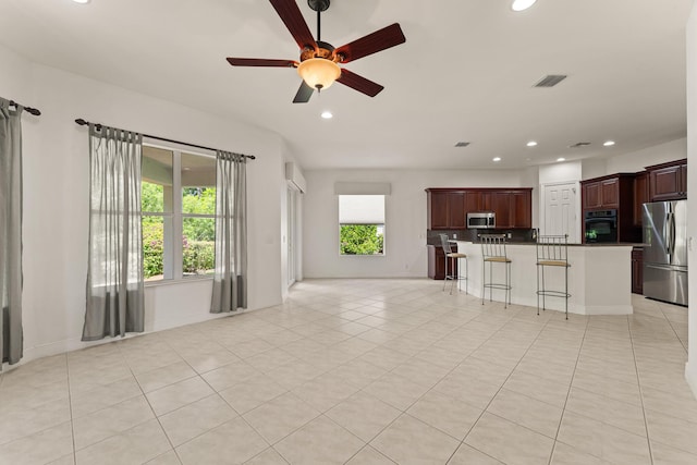 879 SW Pebble Ln, Palm City, FL 34990 - unfurnished living room featuring recessed lighting, a ceiling fan, and light tile patterned floors