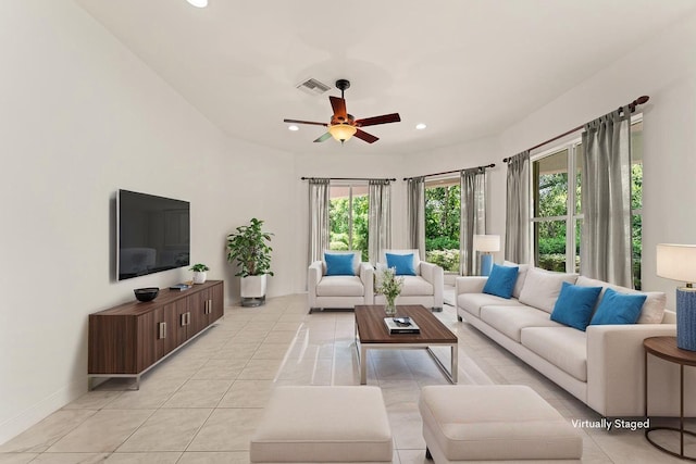 879 SW Pebble Ln, Palm City, FL 34990 - living area featuring a ceiling fan, recessed lighting, and light tile patterned floors