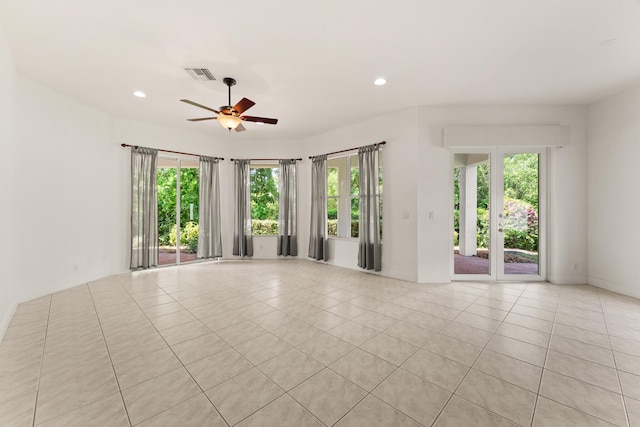 879 SW Pebble Ln, Palm City, FL 34990 - empty room featuring ceiling fan, light tile patterned flooring, and recessed lighting