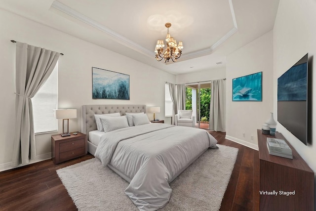 879 SW Pebble Ln, Palm City, FL 34990 - bedroom with a raised ceiling, a chandelier, dark wood-type flooring, and ornamental molding