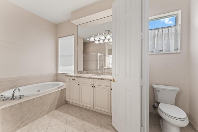 879 SW Pebble Ln, Palm City, FL 34990 - bathroom with a garden tub, vanity, tile patterned floors, and a stall shower