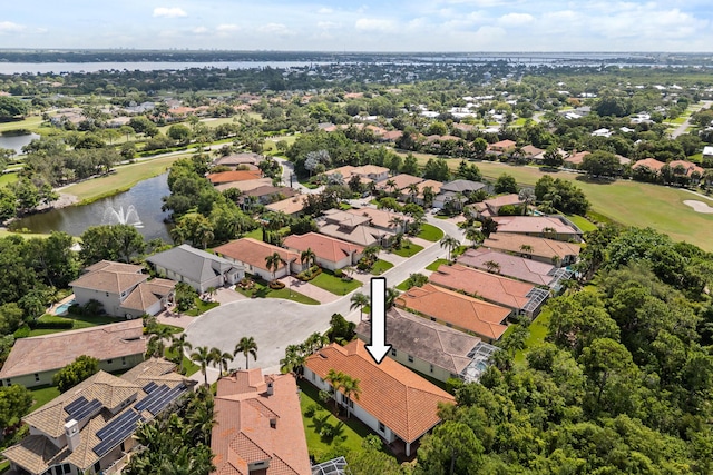 879 SW Pebble Ln, Palm City, FL 34990 - aerial view of residential area with a large body of water and a golf course