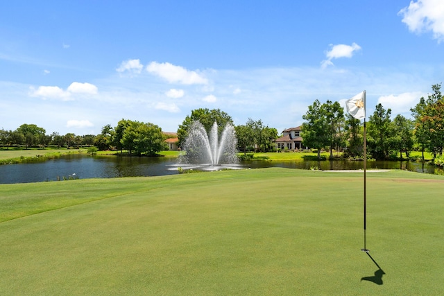 879 SW Pebble Ln, Palm City, FL 34990 - view of property's community with a water view, golf course view, and a yard