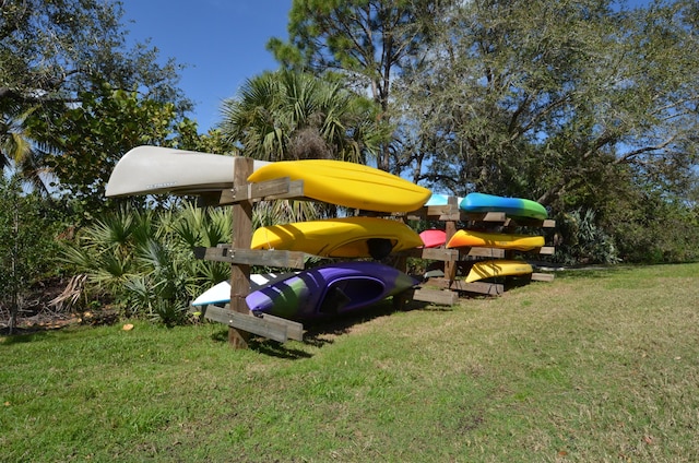 879 SW Pebble Ln, Palm City, FL 34990 - view of playground featuring a lawn