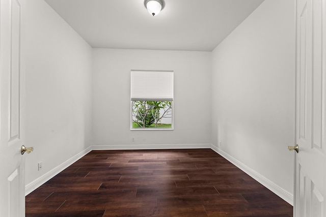 879 SW Pebble Ln, Palm City, FL 34990 - spare room with dark wood-style floors