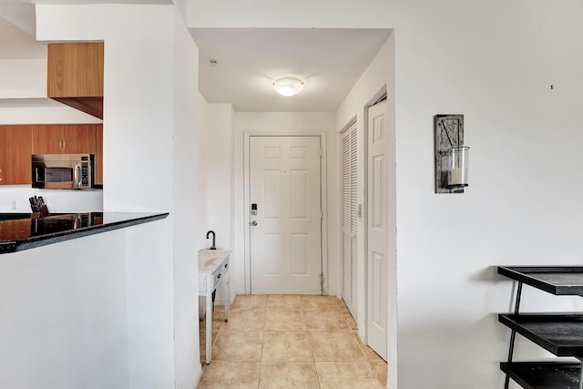 804 E Windward Way Unit 606, Lantana, FL 33462 - doorway to outside with light tile patterned floors
