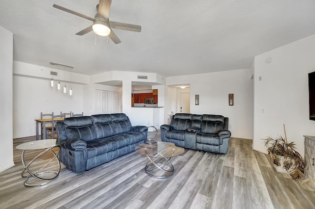 804 E Windward Way Unit 606, Lantana, FL 33462 - living room with wood finished floors and ceiling fan