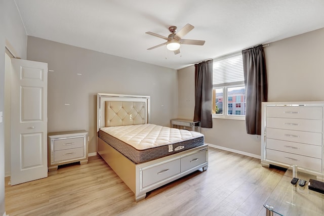 804 E Windward Way Unit 606, Lantana, FL 33462 - bedroom with light wood-style floors and a ceiling fan