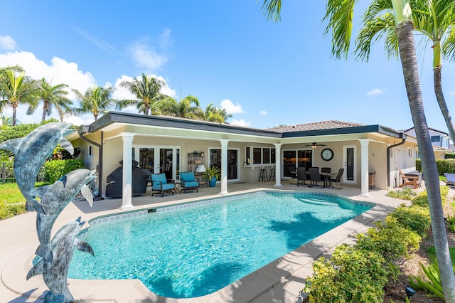 4220 NE 24th Ave, Lighthouse Point, FL 33064 - rear view of house featuring ceiling fan, french doors, a patio, and stucco siding