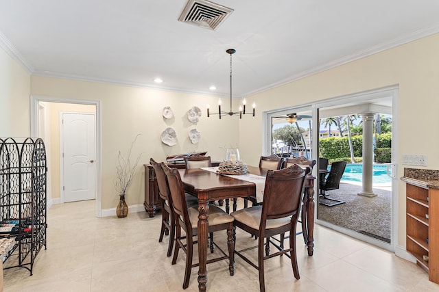 4220 NE 24th Ave, Lighthouse Point, FL 33064 - dining area with ornamental molding, light tile patterned floors, a chandelier, recessed lighting, and ornate columns