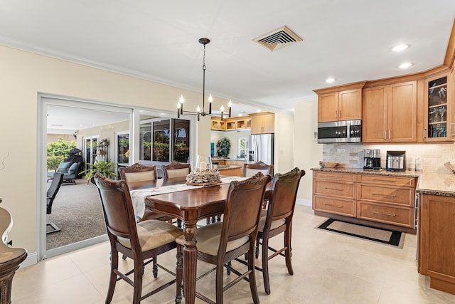 4220 NE 24th Ave, Lighthouse Point, FL 33064 - dining area featuring ornamental molding, a chandelier, light tile patterned flooring, and recessed lighting