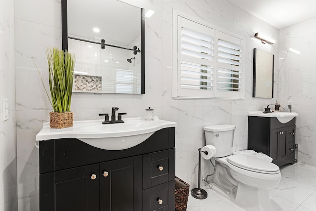 4220 NE 24th Ave, Lighthouse Point, FL 33064 - bathroom featuring marble tiled floors, two vanities, tile walls, and a shower