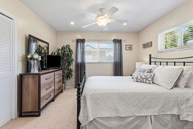 4220 NE 24th Ave, Lighthouse Point, FL 33064 - bedroom with light colored carpet and ceiling fan