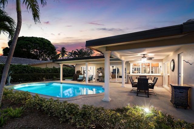 4220 NE 24th Ave, Lighthouse Point, FL 33064 - swimming pool featuring a ceiling fan, a patio, and outdoor dining space