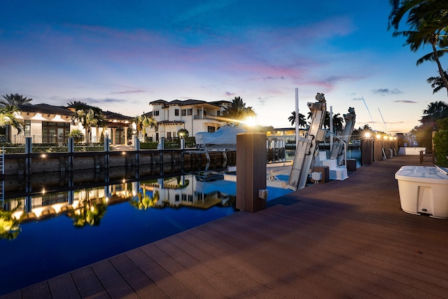 4220 NE 24th Ave, Lighthouse Point, FL 33064 - view of pool featuring boat lift, a water view, and a dock