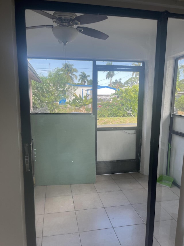 2548 Ida Way Unit 3A, West Palm Beach, FL 33415 - unfurnished sunroom with ceiling fan