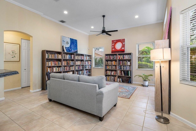 5422 Landon Cir, Boynton Beach, FL 33437 - living area with arched walkways, ceiling fan, recessed lighting, crown molding, and light tile patterned floors