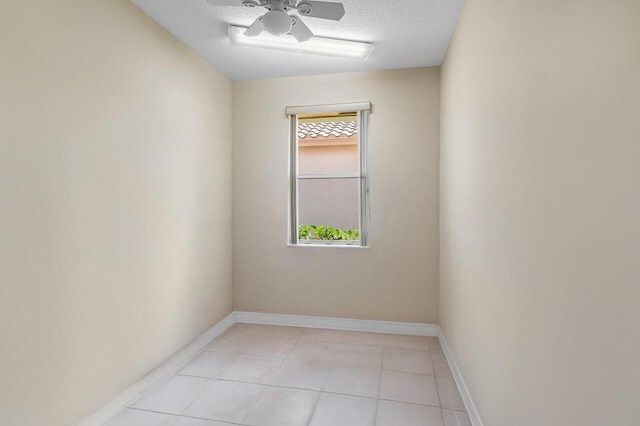 5422 Landon Cir, Boynton Beach, FL 33437 - unfurnished room with ceiling fan, a textured ceiling, and light tile patterned flooring