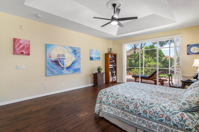 5422 Landon Cir, Boynton Beach, FL 33437 - bedroom featuring wood finished floors, access to outside, a raised ceiling, and ceiling fan