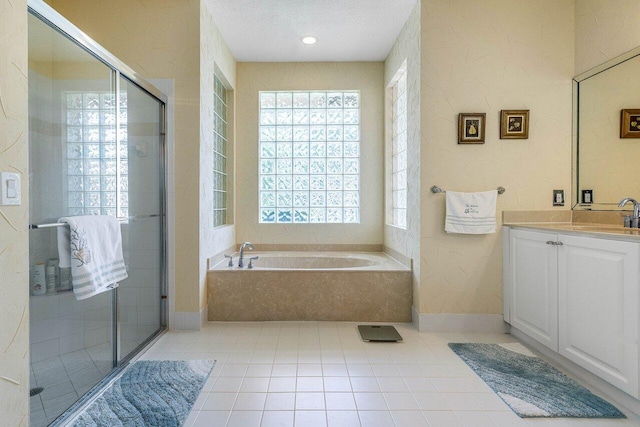 5422 Landon Cir, Boynton Beach, FL 33437 - bathroom with vanity, a bath, plenty of natural light, and a shower stall