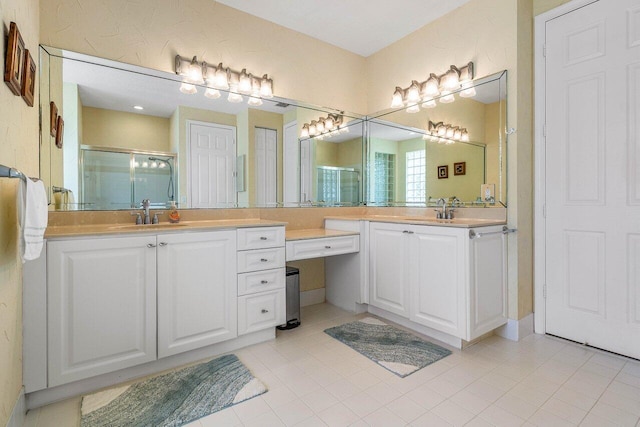 5422 Landon Cir, Boynton Beach, FL 33437 - bathroom with a stall shower, two vanities, and tile patterned flooring