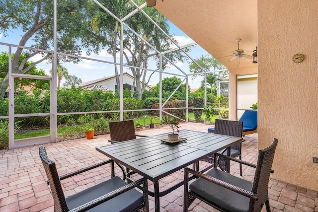 5422 Landon Cir, Boynton Beach, FL 33437 - view of patio / terrace featuring outdoor dining space, a lanai, and a ceiling fan