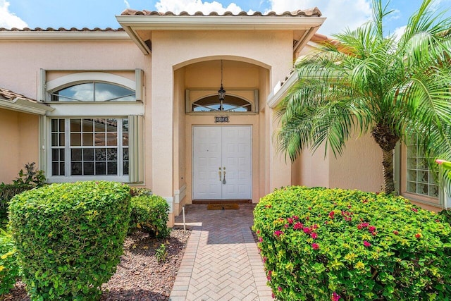 5422 Landon Cir, Boynton Beach, FL 33437 - entrance to property with stucco siding and a tile roof
