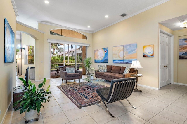 5422 Landon Cir, Boynton Beach, FL 33437 - living room with light tile patterned flooring, recessed lighting, arched walkways, and crown molding