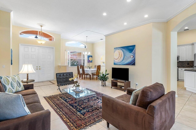 5422 Landon Cir, Boynton Beach, FL 33437 - living room featuring ornamental molding, light tile patterned floors, arched walkways, and recessed lighting