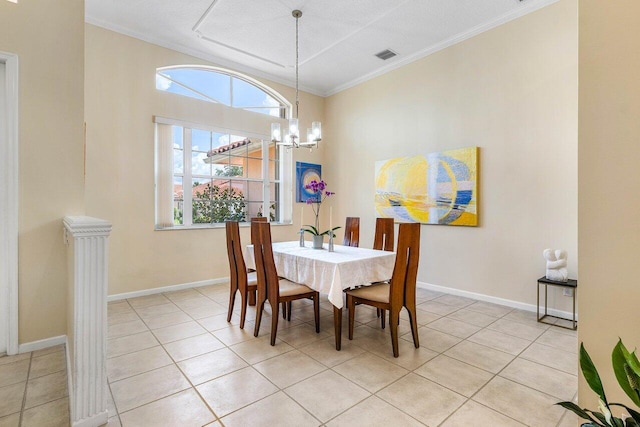 5422 Landon Cir, Boynton Beach, FL 33437 - dining space with a chandelier, crown molding, and light tile patterned flooring
