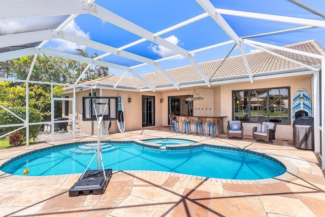 5336 NW 57th Way, Coral Springs, FL 33067 - view of swimming pool with a patio area, a lanai, and a pool with connected hot tub