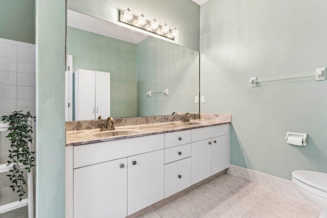 5336 NW 57th Way, Coral Springs, FL 33067 - full bathroom featuring toilet and double vanity