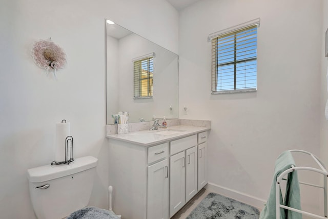 556 SE Mulberry Way, Port Saint Lucie, FL 34984 - bathroom with vanity and toilet