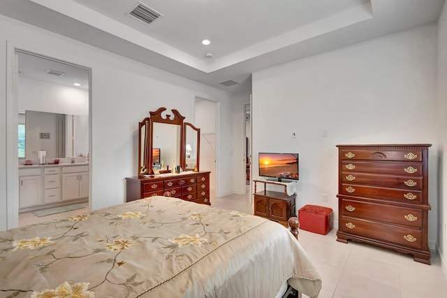 556 SE Mulberry Way, Port Saint Lucie, FL 34984 - bedroom with light tile patterned floors, connected bathroom, and recessed lighting