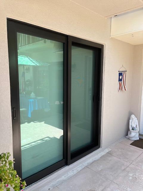 1206 12th Ct, Jupiter, FL 33477 - property entrance featuring stucco siding