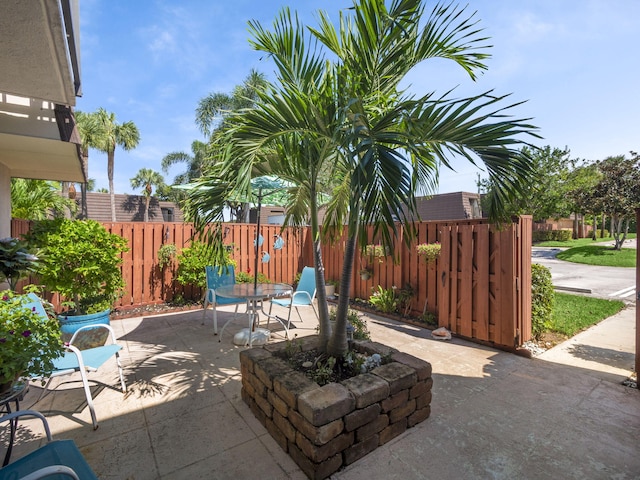 1206 12th Ct, Jupiter, FL 33477 - view of patio / terrace with outdoor dining area