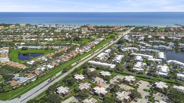 1206 12th Ct, Jupiter, FL 33477 - aerial overview of property's location featuring a large body of water and nearby suburban area