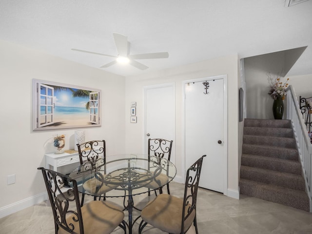 1206 12th Ct, Jupiter, FL 33477 - dining area with ceiling fan and stairway